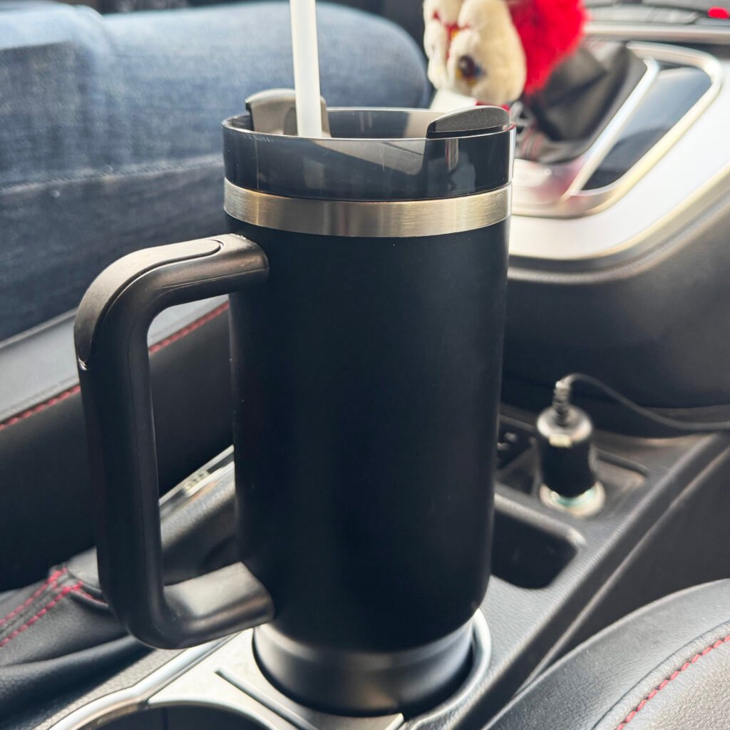 A stainless steel handle cup, portable and flexible to use in car.