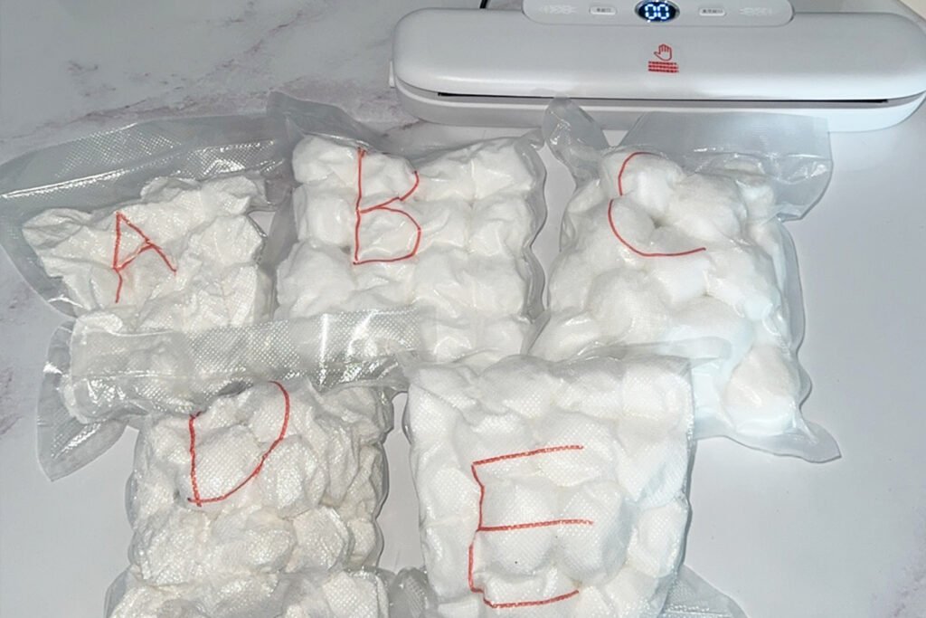 Filter balls vacuum-packed for shipment