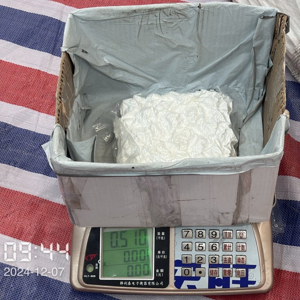 Random Weight Checks on Polyester Fiber Balls Performing random weight checks on polyester fiber balls for consistency.