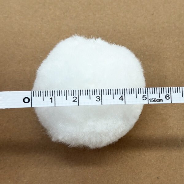 Measurement of a polyester fiber filter ball showing its precise 50mm diameter