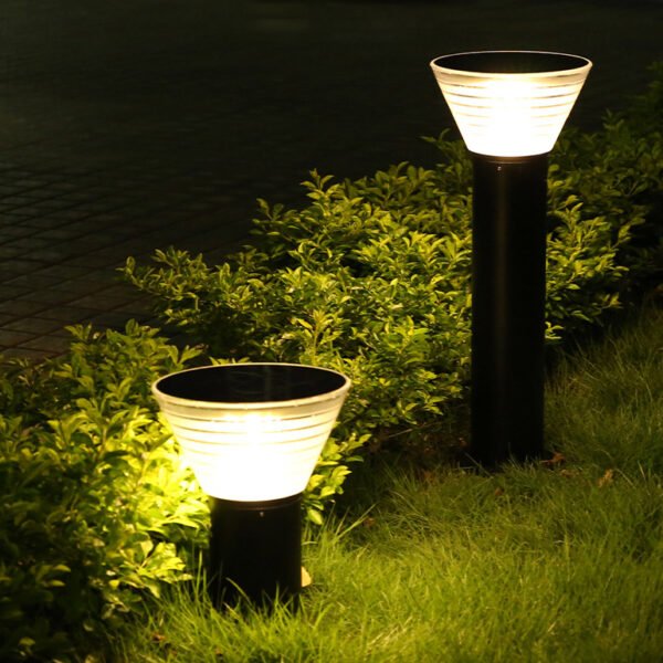 30cm and 60cm Solar Lawn Lights illuminating grass with warm light