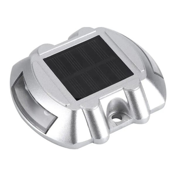 Close-up front view of an LED road stud with a solar panel.