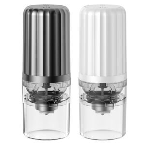 Black and white portable coffee grinders side by side