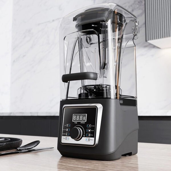 Black juicer blender placed in a modern kitchen, ready for blending