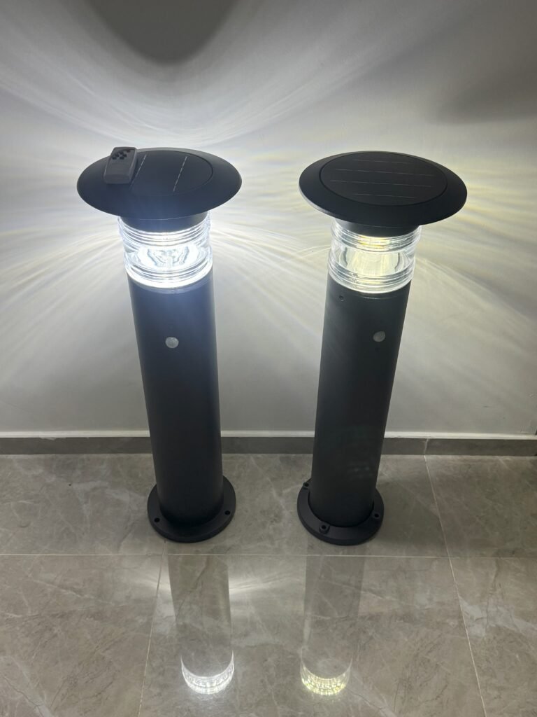 Top View of Solar Landscape Lights in Front of a White Wall Solar landscape lights illuminating a white wall from above