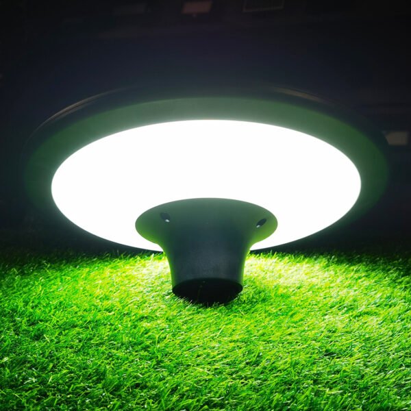 Solar LED light turned on while installed on grass