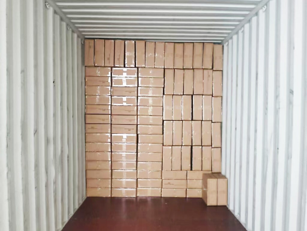 JXNUO supervising the container loading progress at the warehouse.