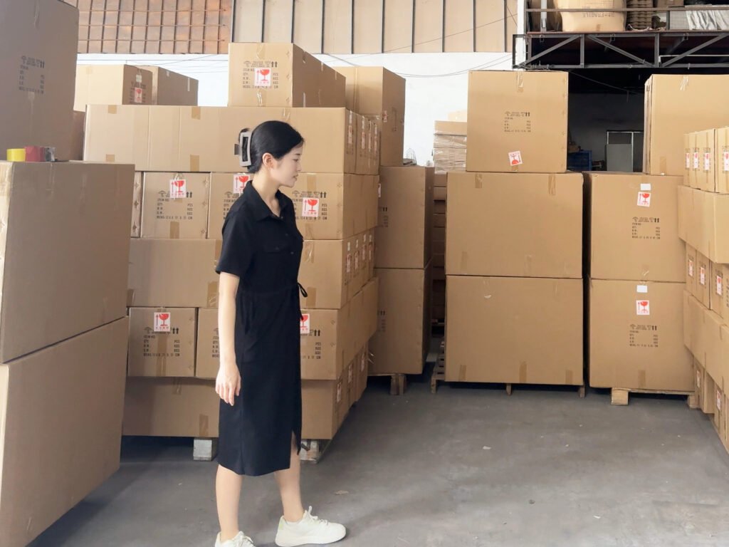 JXNUO performing on-site inspection of goods from multiple suppliers before consolidation.