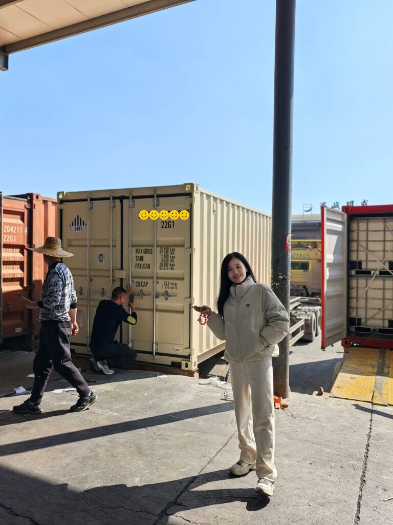 Tiny standing by the sealed container for Europe