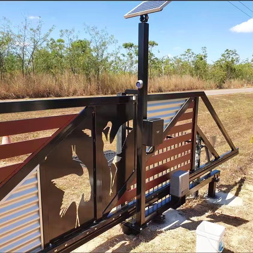 Installed solar sliding gate opener system at a property entrance