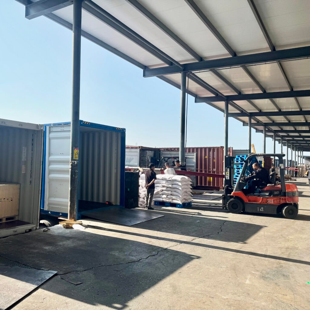 Container loading and warehouse operations during China sourcing and shipment coordination